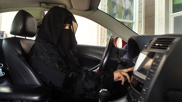 A woman drives a car in Saudi Arabia October 22, 2013.