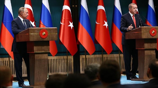 Turkish President Recep Tayyip Erdogan (R) and President of Russia, Vladimir Putin (L) hold a joint press conference following their meeting, at Presidential Complex in Ankara, Turkey