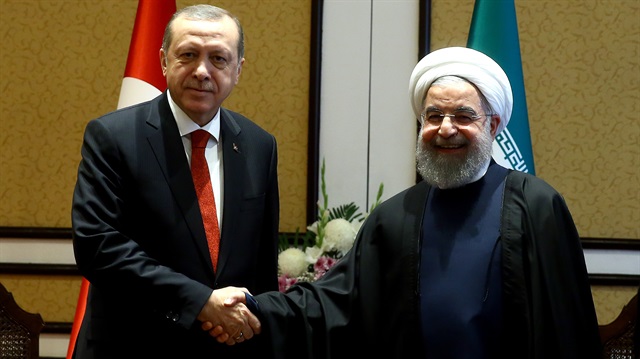 Recep Tayyip Erdoğan (L) and Hassan Rouhani (R).