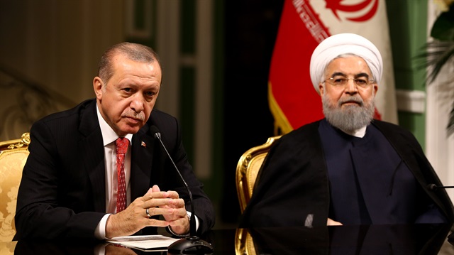 Recep Tayyip Erdogan (L) and Hassan Rouhani (R) 