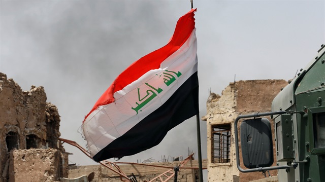 An Iraqi flag is seen 