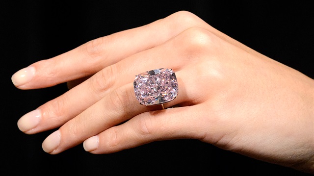 A model wears The Raj Pink 37.3 carat diamond and is the world's largest known fancy intense diamond in London, England.