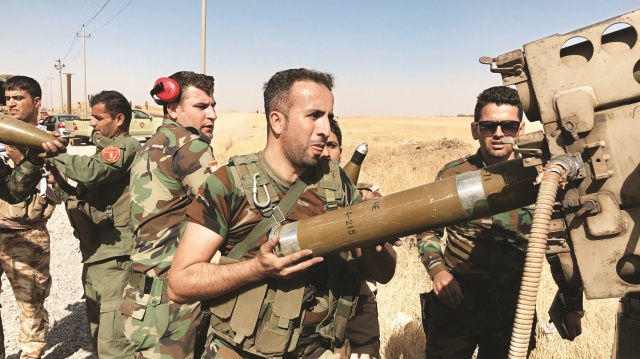 Peşmerge'nin roketatarlı saldırıları, Irak ordusunu püskürtmeye yetmedi.