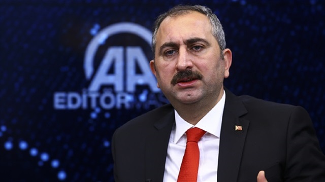 Turkish Justice Minister Abdulhamit Gül speaks to reporters in Ankara, Turkey