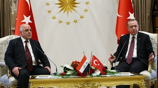 Turkish President Recep Tayyip Erdoğan (R) and Iraqi Prime Minister Haidar al-Abadi 