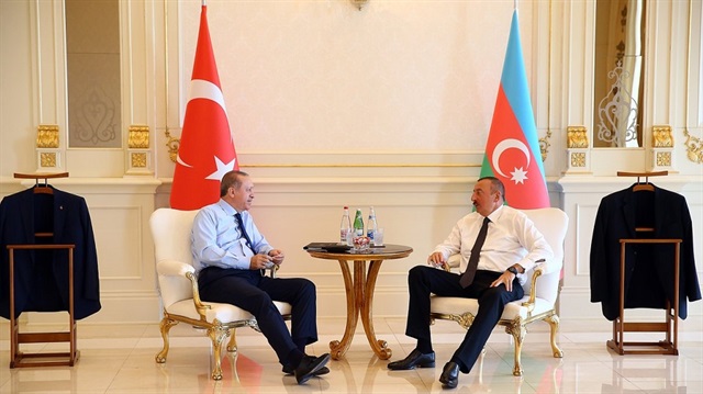 Toplantı sonrası yapılan ikili görüşmede Cumhurbaşkan'ı Erdoğan'ın twitter hesabından paylaşılan fotoğraf.