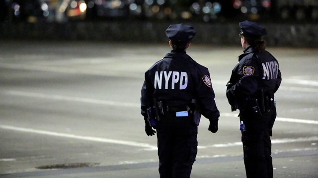 Police look towards the scene of a pickup truck attack on West Side Highway in Manhattan, New York, U.S.