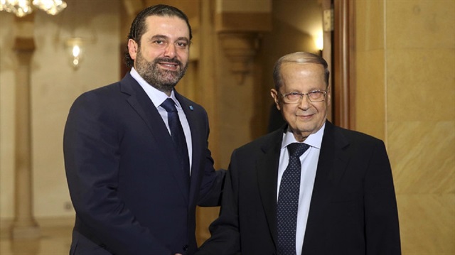 Saad al-Hariri (L) and Michel Aoun (R)