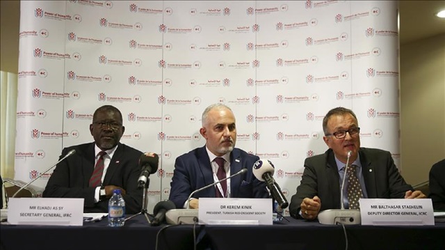 President of Turkish Red Crescent, Kerem Kinik (C), As Sy (L), Secretary General of the International Federation of Red Cross and Red Crescent Societies (IFRC) and Balthasar Staehelin (R), Deputy Director-General at the International Committee of the Red Cross hold a press conference at Kaya Palazzo Golf Resort in Antalya, Turkey