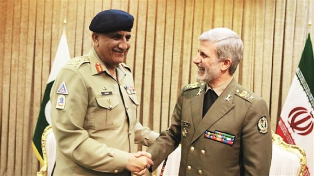 Pakistan’s Chief of Army Staff General Qamar Javed Bajwa (L) and Iranian Brigadier General Amir Hatami (R)