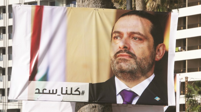 Lübnan sokakları, üzerinde “Seninleyiz” yazılı Hariri posterleriyle donatıldı.