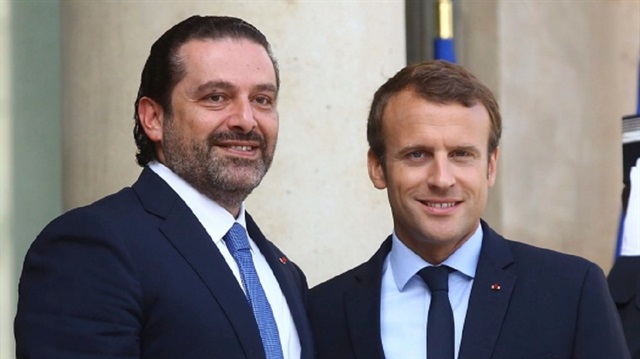 Macron (L) and Hariri (R)