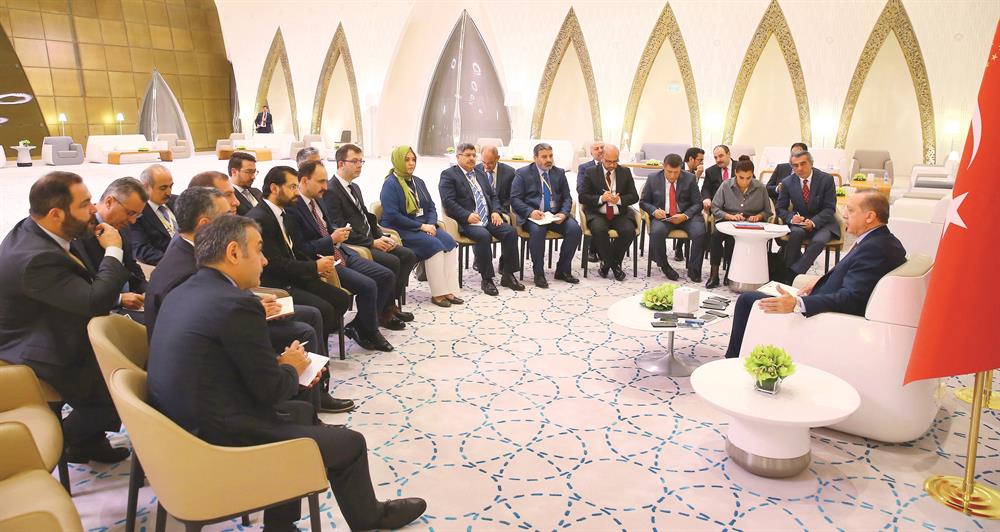Erdoğan, Katar'dan ayrılmadan önce beraberindeki gazetecilerin sorularını cevapladı.