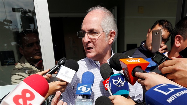 Antonio Ledezma, Venezuelan opposition leader, gives statements to the press during his arrival in Bogota, Colombia.