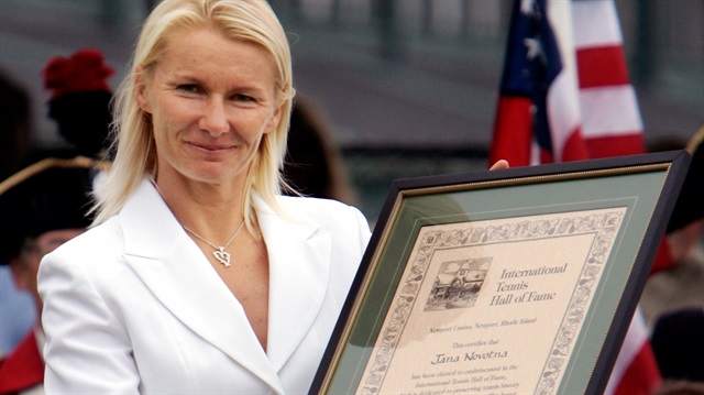 File Photo: Jana Novotna holds up International Tennis Hall of Fame certificate in Newport