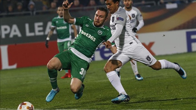 Mossoro (R) of Medipol Basaksehir in action against Cosmin Moti (30) of Ludogorets during the UEFA Europa League Group C soccer match between Ludogorets and Medipol Basaksehir at Ludogorets Arena in Razgrad, Bulgaria