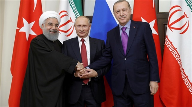 Turkish President Recep Tayyip Erdoğan (R), Russian President Vladimir Putin (C) and Iranian President Hassan Rouhani (L)