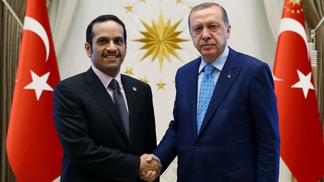 Turkish President Recep Tayyip Erdogan (L) meets with Foreign Minister of Qatar Mohammed bin Abdulrahman bin Jassim Al-Thani (R) in Ankara.