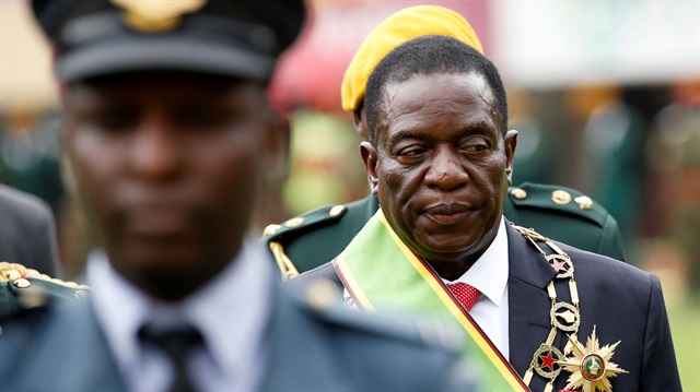 Emmerson Mnangagwa walks after he was sworn in as Zimbabwe's president in Harare, Zimbabwe.