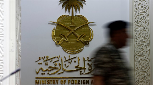 Member of Saudi security forces stands guard before the start of joint a news conference at the headquarters of the Saudi Ministry of Foreign Affairs in Riyadh