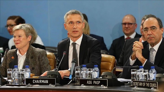 NATO Secretary General Jens Stoltenberg (C) attends the NATO Foreign Ministers' meeting in Brussels, Belgium 