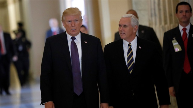 U.S. President Donald Trump and Vice President Mike Pence depart the U.S. Capitol