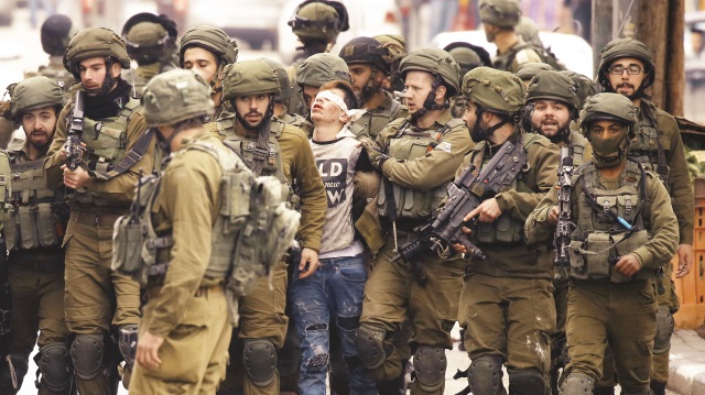 İsrail askerlerinin intifada 
korkusunu gözler önüne serdi.