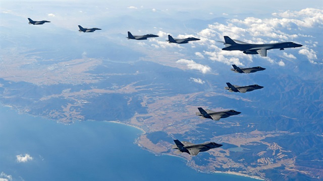 U.S. Air Force B-1B bomber flies in formation during a joint aerial drill called 'Vigilant Ace' 
