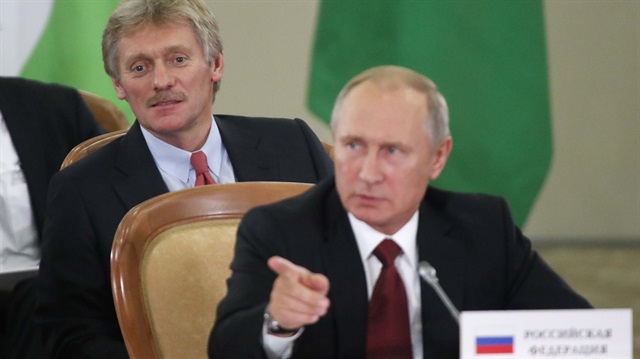 Kremlin Sözcüsü Dimitriy Peskov ve Rusya Devlet Başkanı Vladimir Putin. 