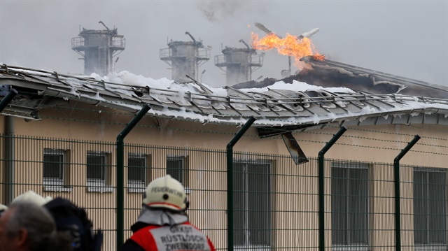 Firefighters are seen at the largest natural gas import and distribution station after a gas explosion in Baumgarten, Austria December 12, 2017.