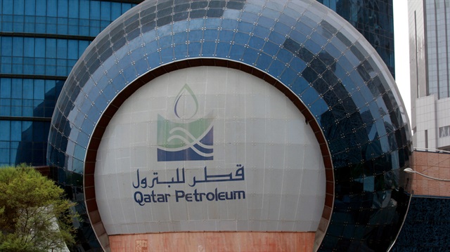 FILE PHOTO: The logo of Qatar Petroleum is seen at its headquartes in Doha