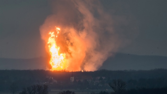 A column of fire is seen after an explosion ripped through Austria's main gas pipeline 