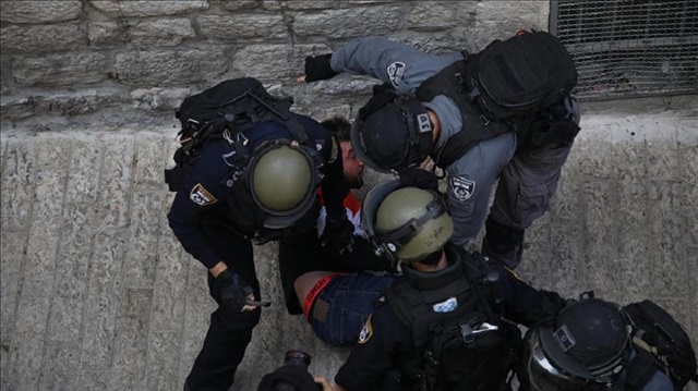 Israeli security forces use force to take a Palestinian demonstrator into custody during a protest against U.S. President Donald Trump’s announcement to recognize Jerusalem as the capital of Israel and plans to relocate the U.S. Embassy from Tel Aviv to Jerusalem, in Old City of Jerusalem on December 15, 2017.