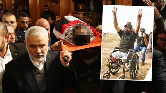 İsrail'in 2008'de Gazze'ye düzenlediği hava saldırısında iki bacağını kaybetmesine rağmen katıldığı Kudüs'e destek gösterilerinde İsrail askerlerinin müdahalesi sonucu şehit olan Filistinli İbrahim Ebu Süreyya (29) için Gazze kentinde cenaze töreni düzenlendi. Cenaze törenine Hamas'ın Siyasi Büro Başkanı İsmail Heniyye (solda) ve Filistinli grupların yöneticileri katıldı.