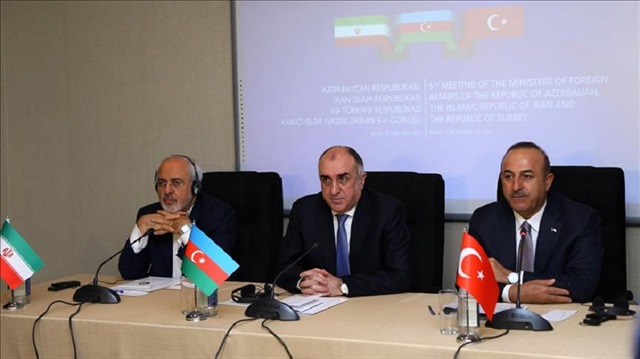 Foreign Minister of Turkey Mevlut Cavusoglu (R), Iranian Foreign Minister Mohammad Javad Zarif (L) and Foreign Minister of Azerbaijan Elmar Mammadyarov (C) hold a joint press conference as part of the 5th Trilateral Meeting of Foreign Ministers of Turkey, Azerbaijan and Iran in Baku, Azerbaijan