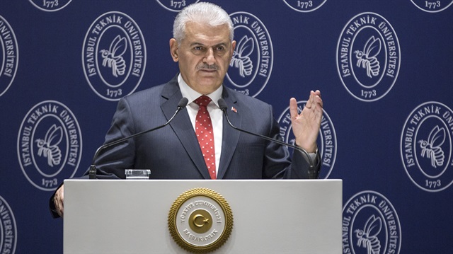 Turkish Prime Minister Binali Yıldırım delivers a speech as he attends the Istanbul Technical University (ITU) alumni summit at Ankara Hotel in Ankara, Turkey on December 21, 2017.