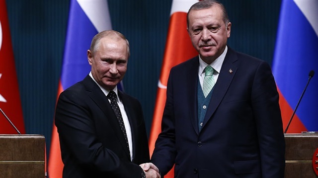 Turkish President Recep Tayyip Erdoğan (R) and his Russian counterpart Vladimir Putin (L)