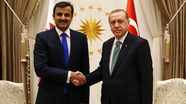 President of Turkey, Recep Tayyip Erdoğan (R) shakes hands with Qatari Sheikh Tamim bin Hamad Al Thani (L) at Presidential Complex in Ankara, Turkey.