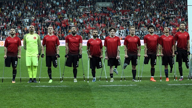 File Photo: Players of Turkey greet the supporters ahead of the European Amputee Football Federation (EAFF) European Championship final match between Turkey and England at Vodafone Park in Istanbul, Turkey