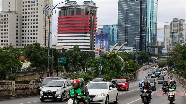 Traffic is seen at the Kuningan business district in Jakarta