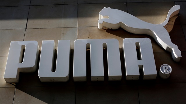 File Photo: The logo of German sports goods firm Puma is seen at the entrance of one of its stores in Vienna