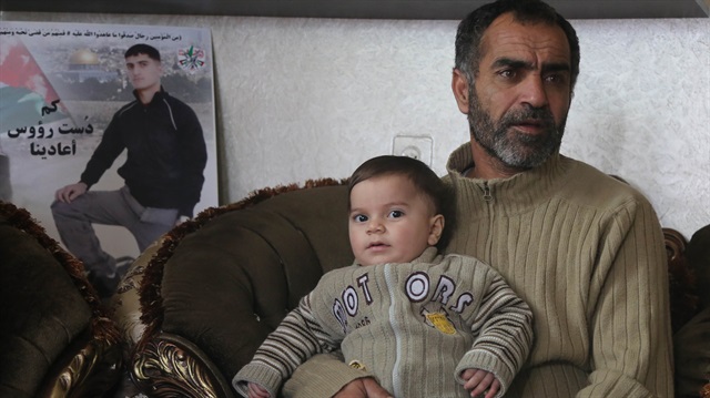 ​İsrail ordusunun üç yıl önce vurarak şehit ettiği Filistinli aktivist Guneymat’ın ailesi... 