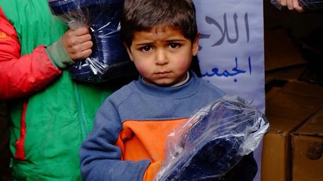 Suriyeli çocukların yüzü çizme ile güldü