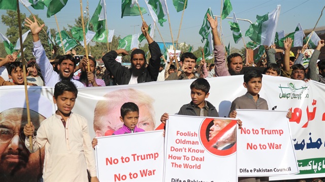 Supporters of Difa-e-Pakistan Council chant slogans during a protest against US President Donald Trump's statement against Pakistan in Karachi on January 02,2018