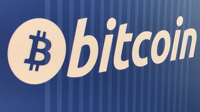 A Bitcoin logo is seen on a cryptocurrency ATM in Santa Monica