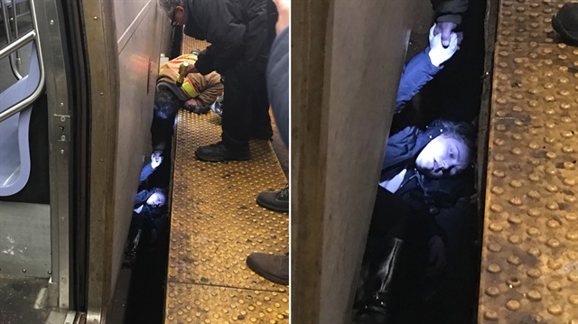 ​ABD’nin New York kentinde metro rayına düşen 22 yaşındaki Rikke Bukh, trenle duvar arasında mahsur kaldı.  