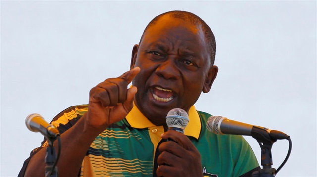 African National Congress (ANC) President Cyril Ramaphosa addresses supporters during the Congress' 106th anniversary celebrations, in East London, South Africa
