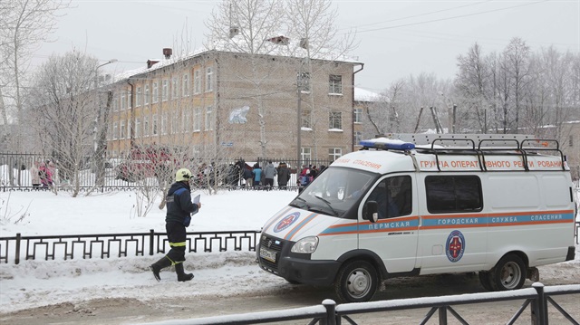 A vehicle of the Russian Emergencies Ministry is parked near a local school after reportedly several unidentified people wearing masks injured schoolchildren with knives in the city of Perm, Russia January 15, 2018.