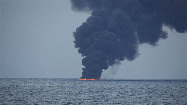 Flames and smoke from the Iranian oil tanker Sanchi is seen in the East China Sea, on January 15, 2018 in this photo provided by Japan's 10th Regional Coast Guard. 