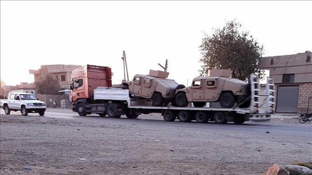 Trucks carrying US military equipment arrives in Al-Hasakah, Syria on July 10, 2017.